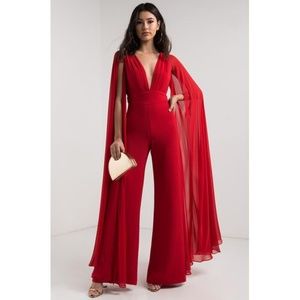 AKIRA Red Cape-Style Deep V Jumpsuit